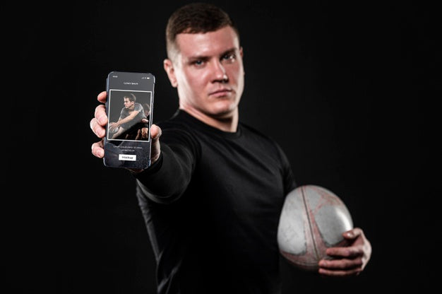 Medium Shot Man Holding Smartphone Psd