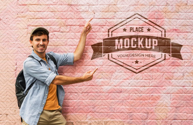 Medium Shot Man Pointing At Wall Psd