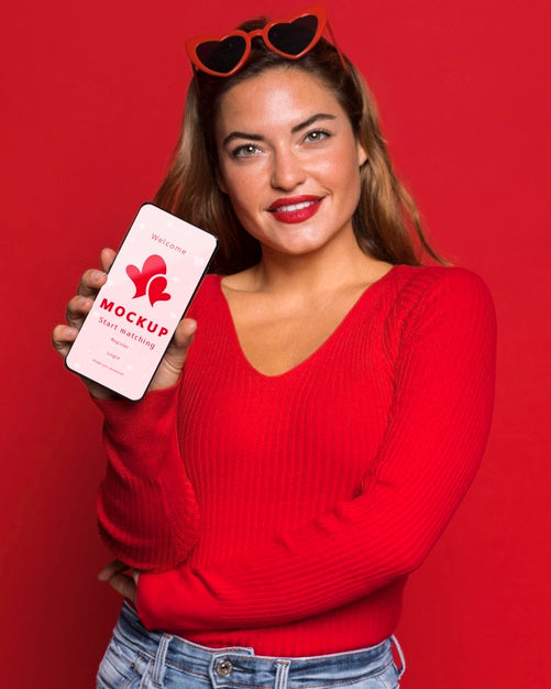 Medium Shot Smiley Woman Holding Smartphone Psd