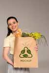 Medium Shot Woman Holding Bag With Vegetables Psd