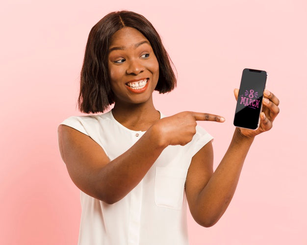 Medium Shot Woman Pointing At Her Smartphone Psd