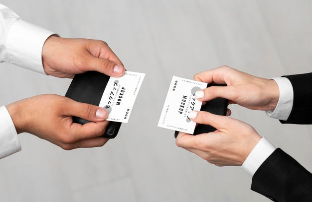 Men Holding Business Cards Mock-Up Psd