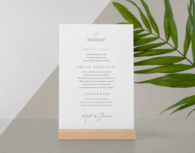 Menu Mock-Up With Wooden Stand And Leaf Psd