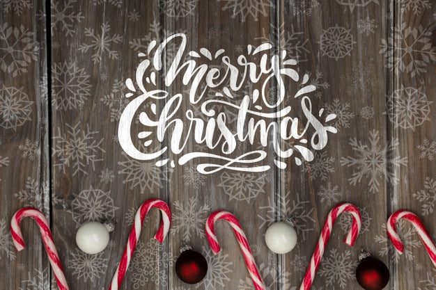 Merry Christmas Message Beside Candy Cane Psd