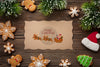 Merry Christmas Mock-Up And Candies And Christmas Pine Leaves Psd