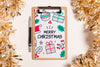 Merry Christmas Mock-Up Clipboard And Golden Tinsel Psd