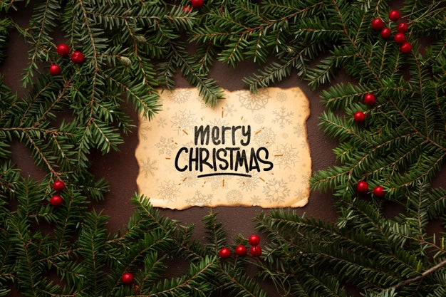 Merry Christmas On A Vintage Paper And Christmas Pine Leaves Psd