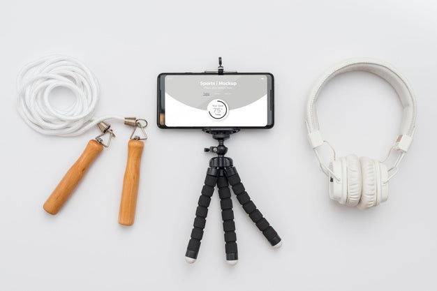 Mobile And Headphones Beside Jumping Rope Psd