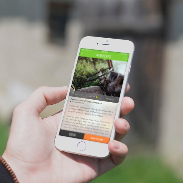 White iPhone 7 Mockup Outdoors in a Hand