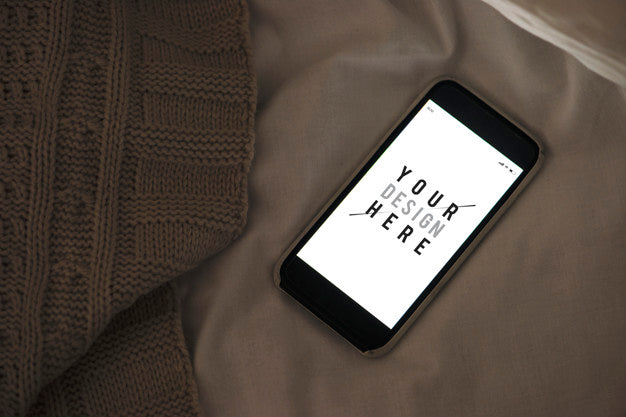 Mobile Phone Screen Mockup On Sheet Surface Psd