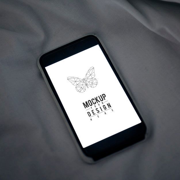 Mobile Phone Screen Mockup On Sheet Surface Psd