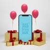 Mobile Phone Surrounded By Presents And Balloons Psd