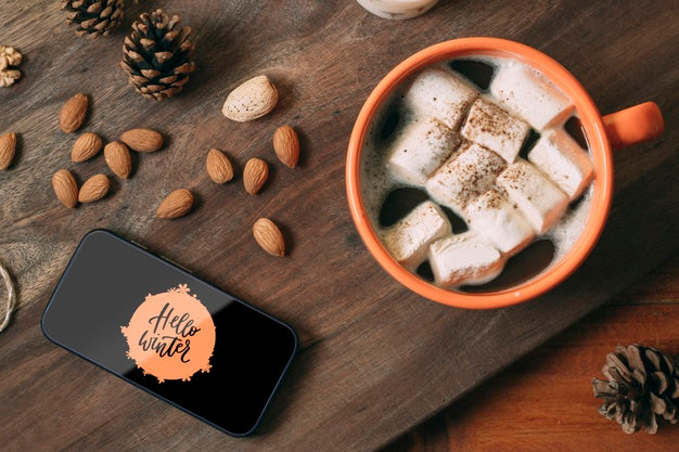 Mobile Phone With Hello Winter And Delicious Winter Drink Psd