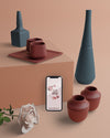 Mock-Up 3D Decorations With Phone On Table Psd