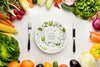 Mock-Up And Cutlery With Frame Made From Delicious Fresh Veggies Psd