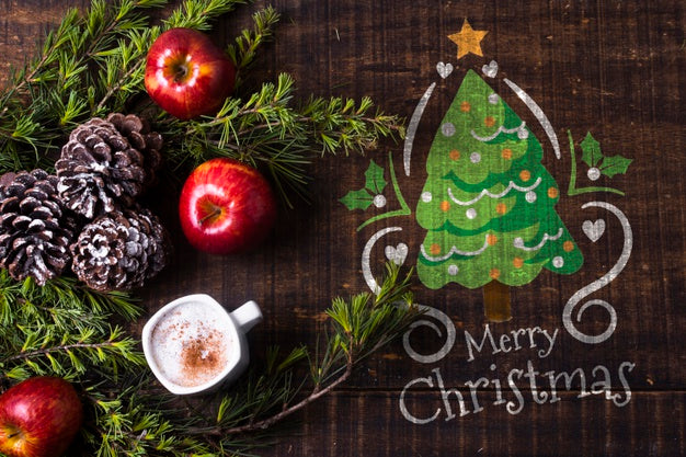 Mock-Up Coronet Branches With Apple And Drink On Table Psd