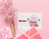 Mock-Up Cute Card With Wrapped Gift And Flowers Psd
