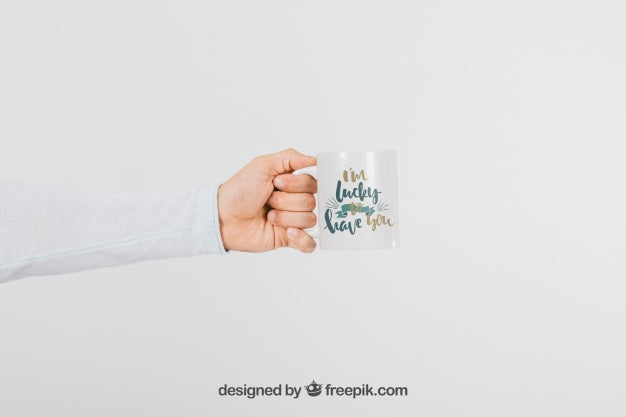 Mock Up Design Of Hand With Mug Psd