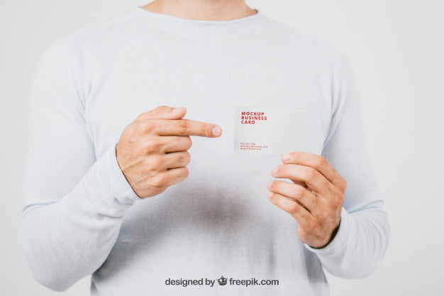 Mock Up Design With Business Card And Pointing Finger Psd