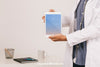 Mock Up Design With Doctor'S Hands Holding Tablet Psd