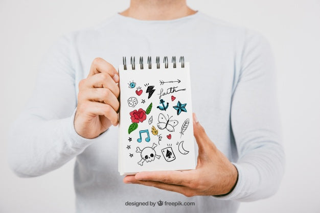 Mock Up Design With Hands Holding Notebook Psd