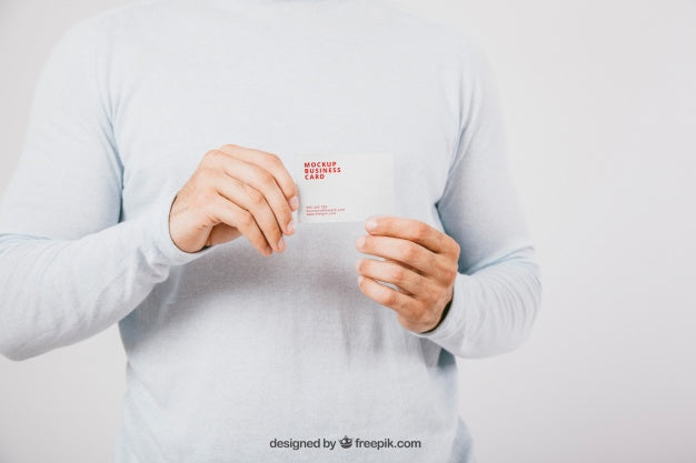 Mock Up Design With Man Holding Business Card Psd