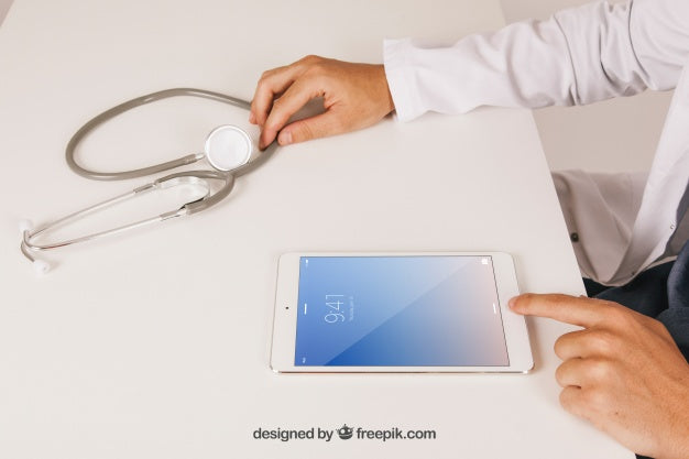Mock Up Design With Medical Doctor Working With Tablet Psd