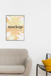 Mock-Up Frame Above Couch Indoors Psd
