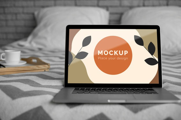 Mock Up Laptop On Bed Psd