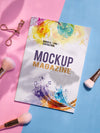 Mock Up Magazine Next To Makeup Brushes Psd