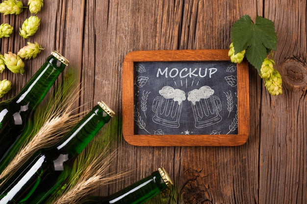 Mock-Up Mug Draw And Bottles With Beer Beside Psd