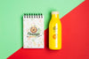 Mock-Up Notepad And Plastic Bottle With Smoothie Psd
