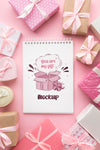 Mock-Up Notepad Surrounded By Gift Boxes Psd