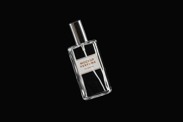 Mock-Up Of Clear Bottle Of Perfume On Black Background Psd