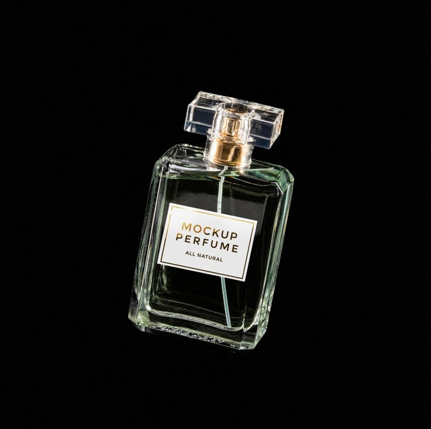 Mock-Up Of Clear Bottle Of Perfume On Black Background Psd