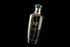 Mock-Up Of Clear Bottle Of Perfume On Black Background Psd