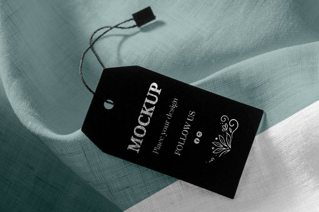 Mock-Up Of Clothing Black Labels On Soft Fabric Psd