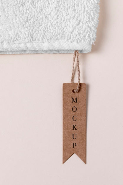 Mock-Up Of Clothing Brown Label On Towel Fabric Psd