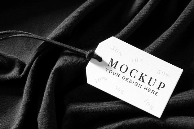 Mock-Up Of Clothing Label On Black Soft Fabric Psd