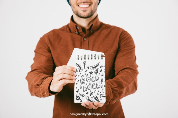 Mock Up Of Young Man With Notebook Psd