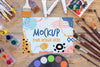 Mock-Up Paper Surrounded By Paint Brushes Psd
