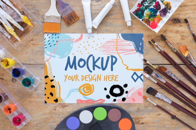 Mock-Up Paper Surrounded By Paint Brushes Psd