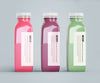 Mock-Up Plastic Bottles With Different Fruit Or Vegetable Juices Psd