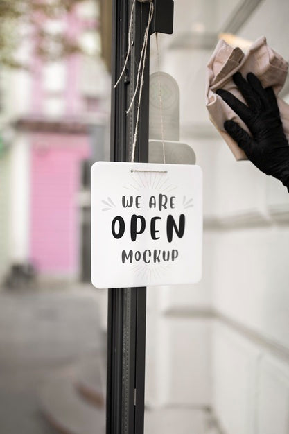 Mock-Up Sign Hanging On The Door Psd
