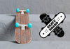 Mock-Up Skateboard Next To Logo Psd
