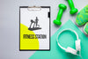 Mock-Up With Fitness Equipment And Headphones Psd
