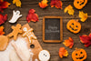 Mock-Up With Halloween Treats And Autumn Leaves Psd