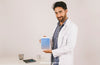Mock Up With Medical Doctor Holding Tablet Psd