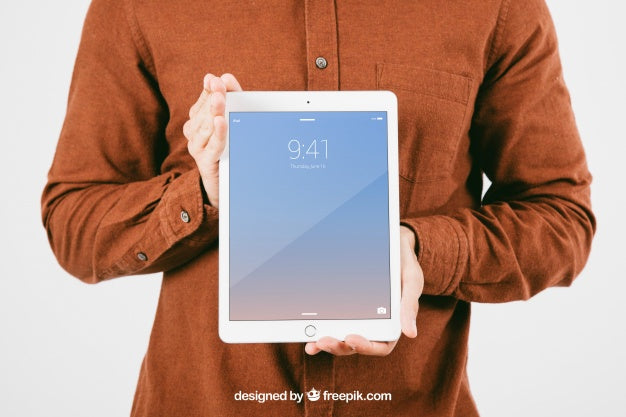 Mock Up With Young Man Holding Tablet Psd