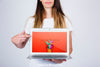 Mockup Concept Of Woman Presenting Laptop Psd